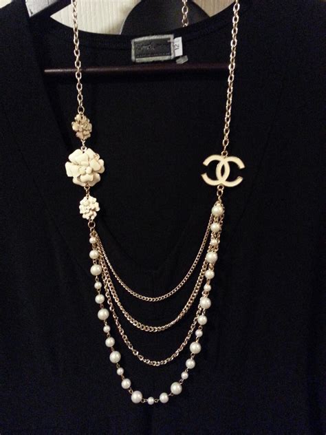 light green chanel necklace|Chanel ring necklace.